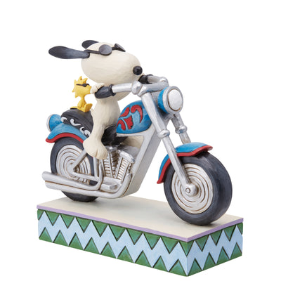 Snoopy und Woodstock auf dem Motorrad